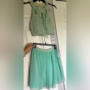 Extraordinary two-piece mint dress. Junior size 9. New with tags.